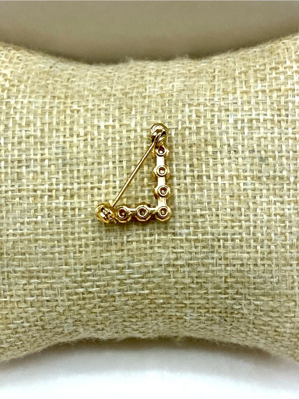 Gold-Tone Pearl “L” Triangle Brooch